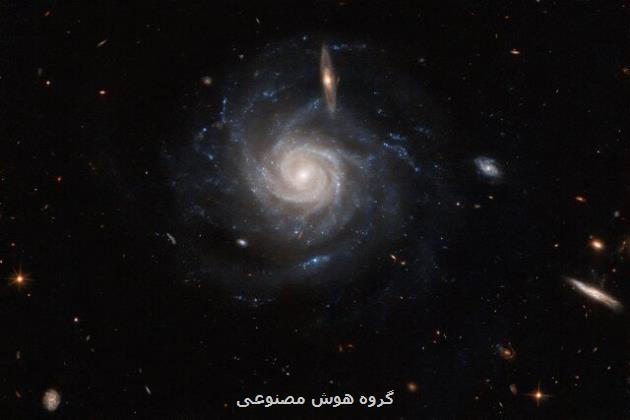 عکس تلسکوپ فضایی هابل از یک کهکشان مارپیچی میله ای